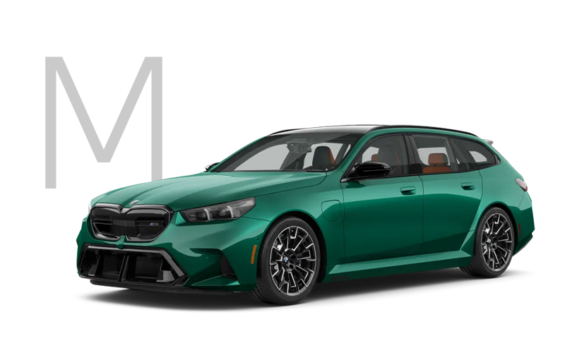 The new BMW M5 Touring in green with M logo. | BMW of Allentown in Allentown PA