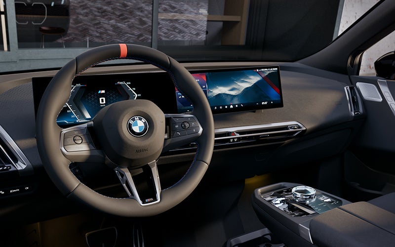 Interior steering wheel and dashboard of the BMW iX M70. | BMW of Allentown in Allentown PA
